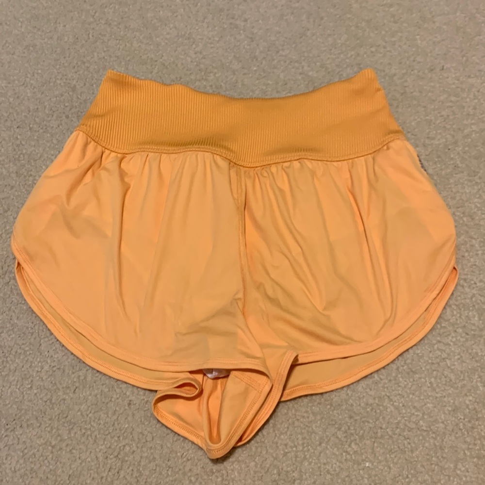 Yellow Free People Movement shorts. Size L